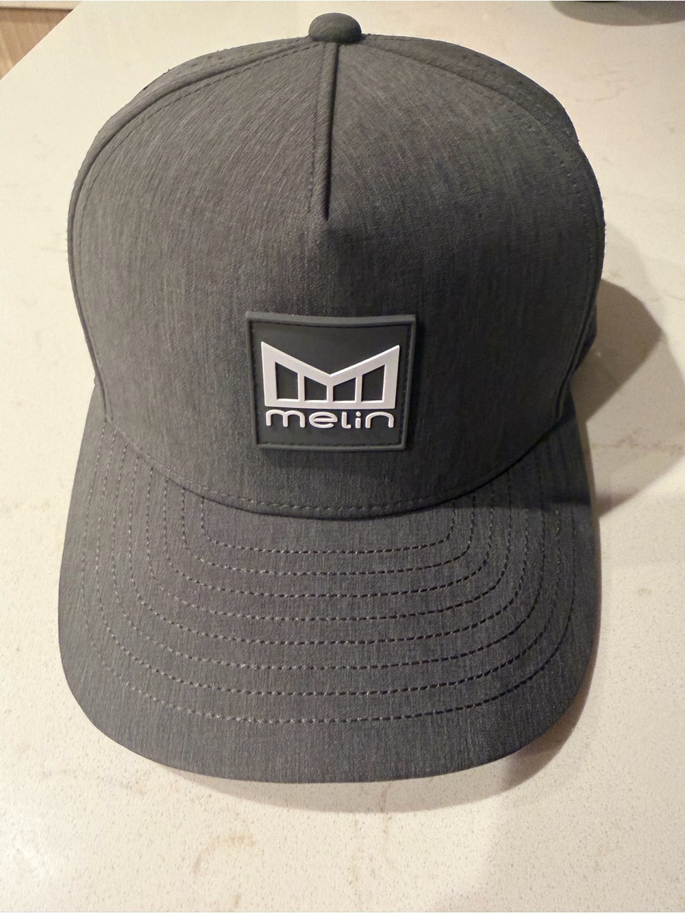 Melin Odysea Hydro Hat in Charcoal Gray